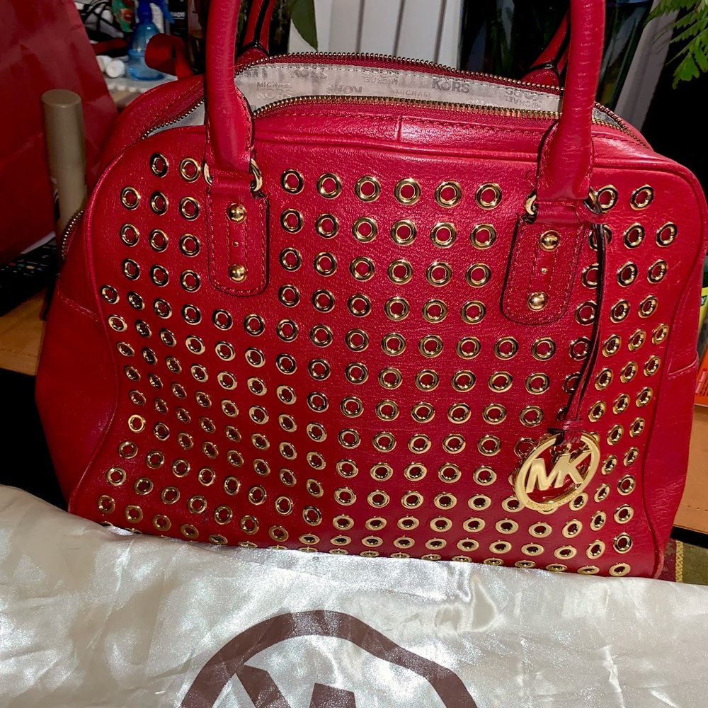 Pre owned Michael Kors handbag with gold  studs. In excellent condition